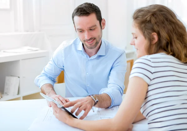depositphotos_54483261-stock-photo-real-estate-agent-and-customer
